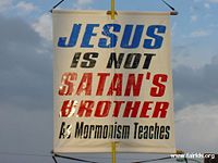 An Anti-Mormon poster at the 2004 Mesa Easter Pageant betrays its poor understanding of what "Mormonism" actually teaches.