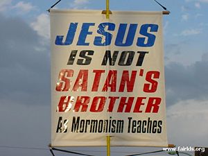 An Anti-Mormon poster at the 2004 Mesa Easter Pageant betrays its poor understanding of what "Mormonism" actually teaches.